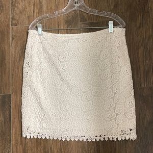 Jennifer Lopez white eyelet skirt